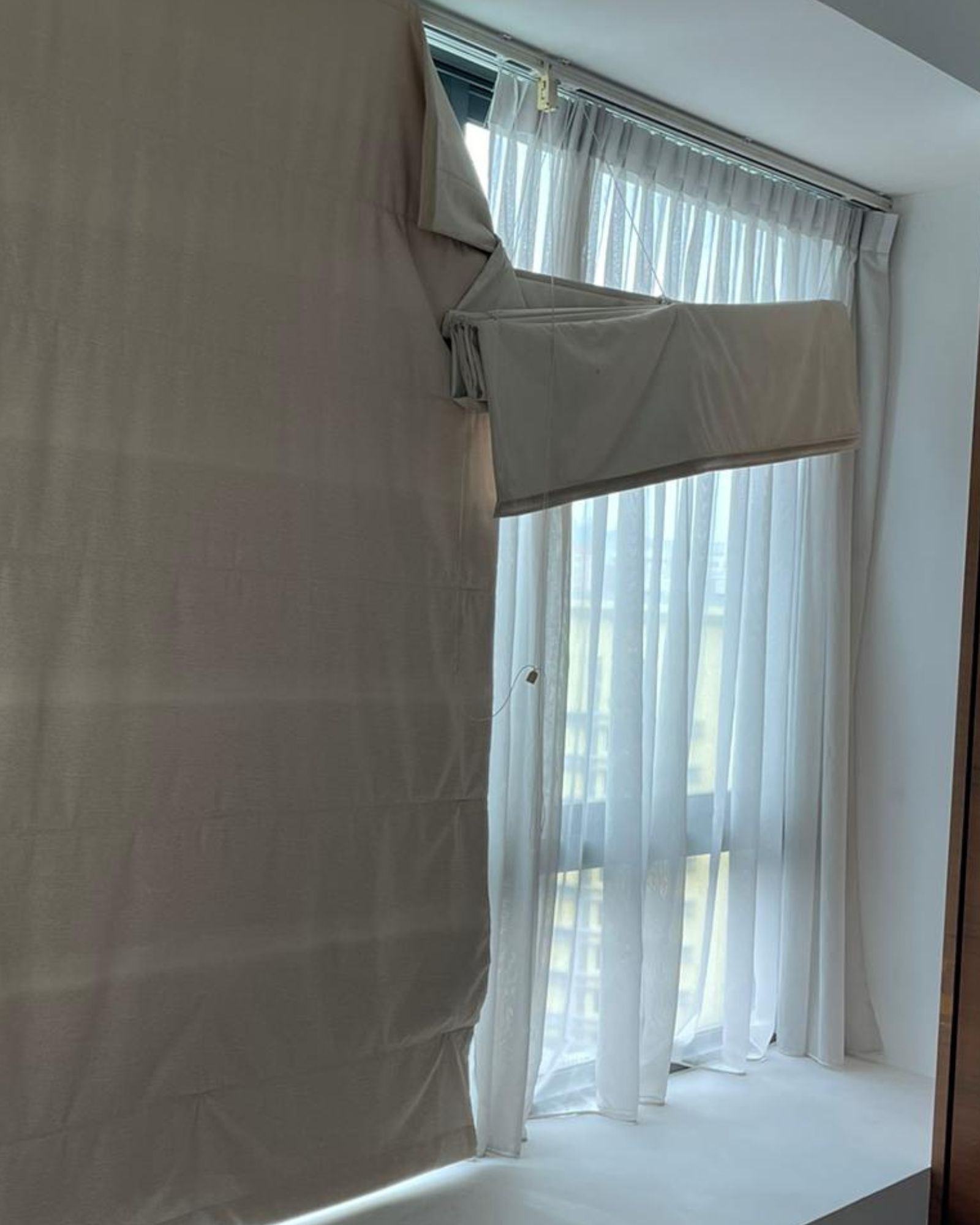 Curtain fallen off its ceiling track